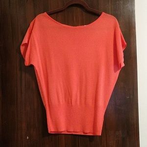 Orange short sleeved shirt